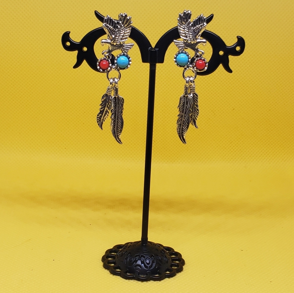 One Pair of silvery Eagle and Feather Earrings